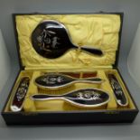 A tortoiseshell and silver piquet six piece dressing set, London 1925, all original including the