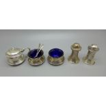 A five piece silver cruet set, 129g, one glass liner matched