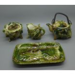 A 'Shell' majolica ceramic tea service with teapot, cream, sugar and tray