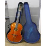 A 1929 Clifford Essex Paragon guitar with original H.S. case. According to the information in the