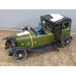 A vintage tin plate car