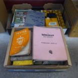 A collection of car manuals, leaflets, brochures, booklets, etc.