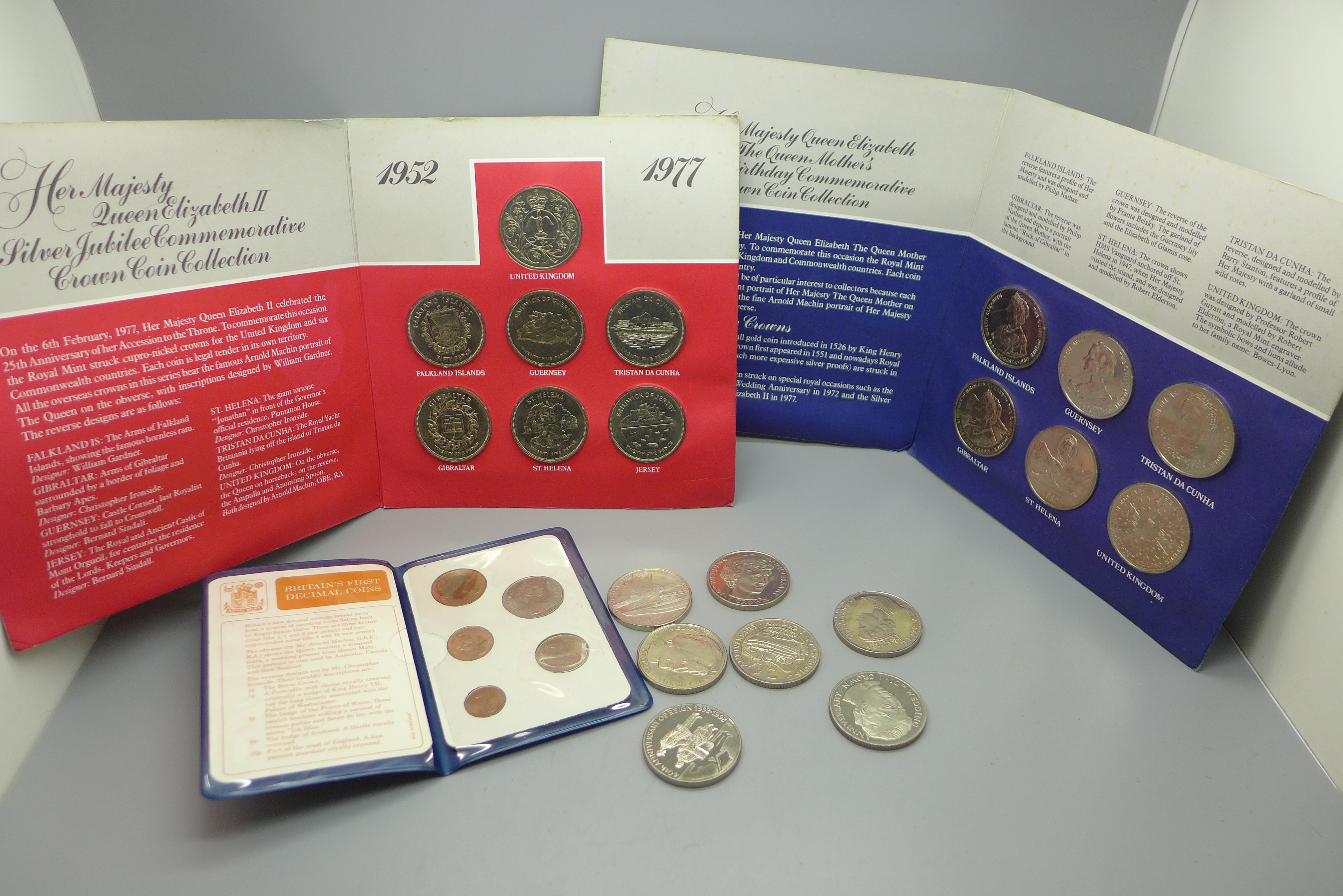 Nineteen crowns and a decimal coin folder