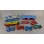 Assorted Corgi and Dinky Toys die-cast vehicles, including Corgi Transporter, playworn