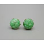 A pair of carved jade earrings, the butterflies marked 9ct