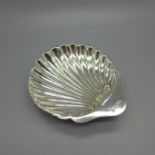 A silver oyster shell butter dish, Sheffield 1909, 59g