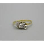 An 18ct gold old cut, three stone diamond ring, 85pt diamonds, circa 1920, 2.6g, S