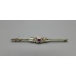 An Art Deco 18ct gold, ruby and rose cut diamond brooch, circa 1920, 5.5cm, 2.6g