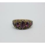 A Victorian 9ct gold and almandine garnet ring, Birmingham 1881, 1.5g, P