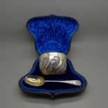 A white metal bowl and silver spoon, spoon London 1893, 96g