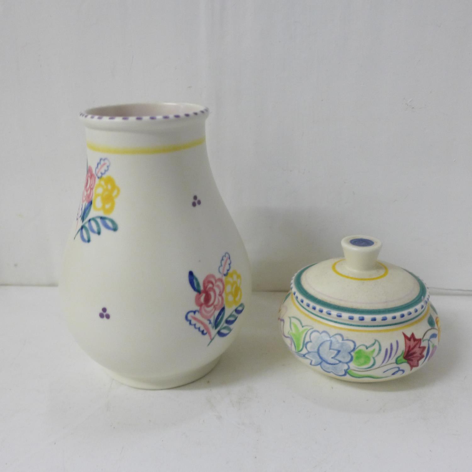 A Poole Pottery vase and lidded pot