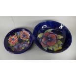 A Moorcroft bowl, a/f, 26cm and a dish, 22cm