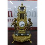 A French style Imperial gilt metal mantel clock