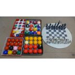 A chess board and snooker/pool balls