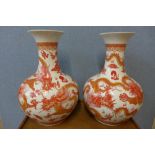 A pair of Chinese ironstone red and white porcelain vases