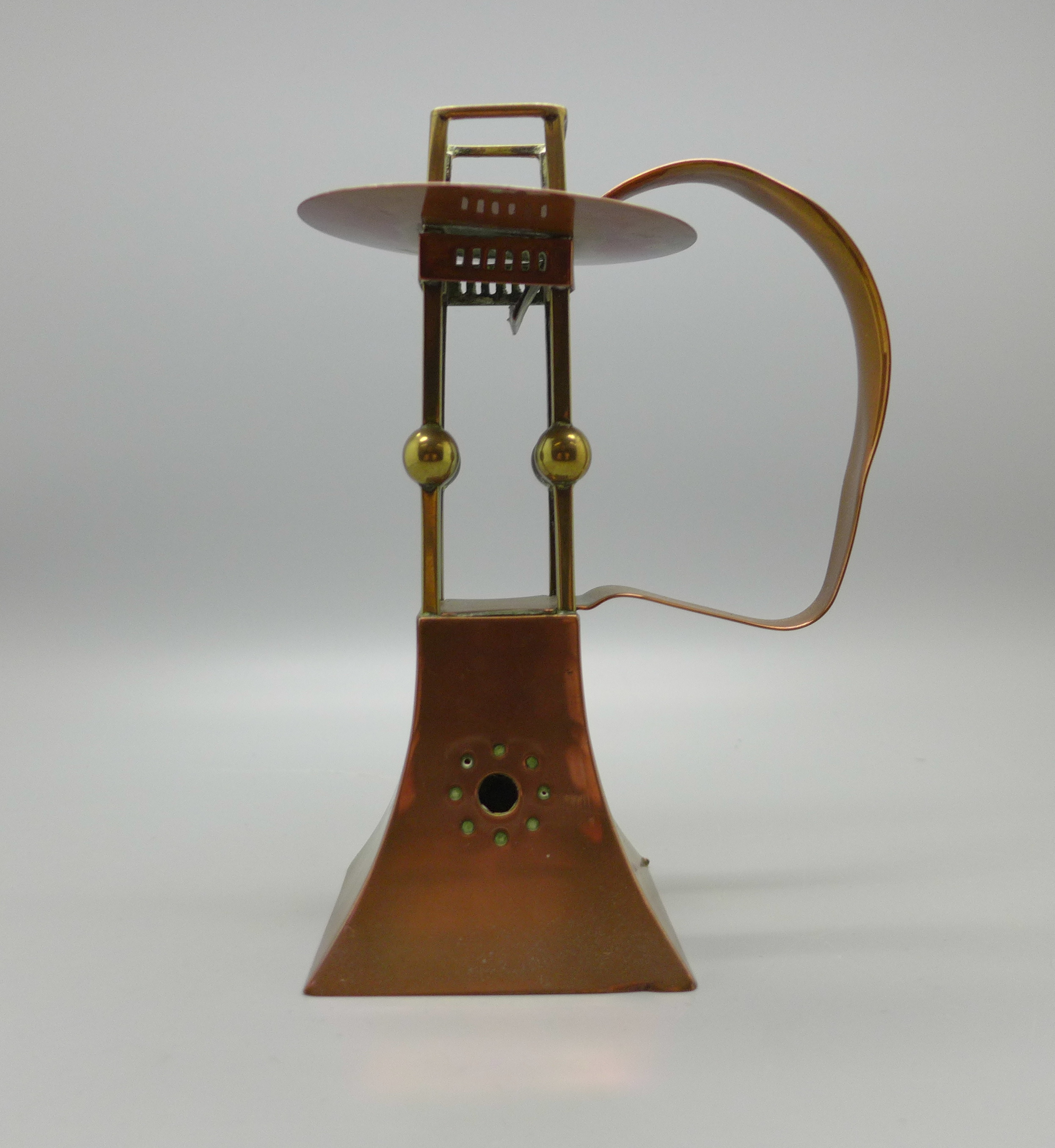 A Carl Deffner Esslingen Arts and Crafts brass and copper candle holder, 15.5cm