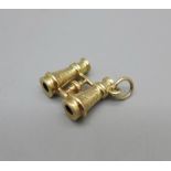 A 9ct gold binoculars charm, 1.1g