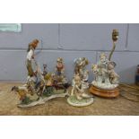 Four Capodimonte figures, a figure of a robin and stoat and a figural lamp stand