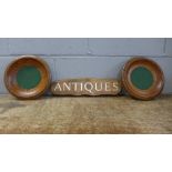 An 'Antiques' sign and two ecclesiastical collection bowls