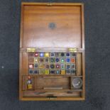 An artist's paint box and contents