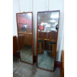 A pair of G-Plan teak framed mirrors