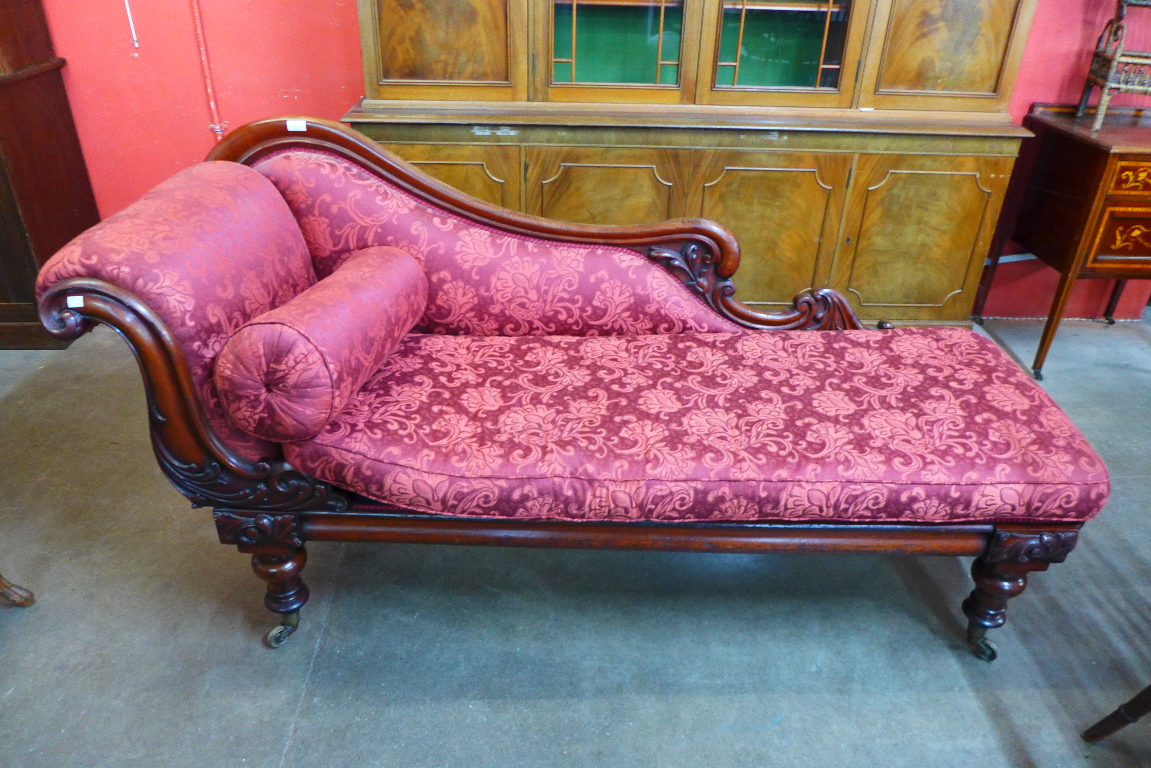 A Regency mahogany and fabric upholstered chaise longue