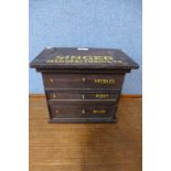 A small beech table top haberdashery shop chest, bearing painted Singer Manufacturing Co.