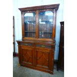 A Victorian Aesthetic Movement carved oak bookcase