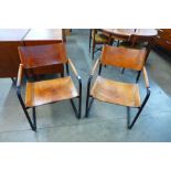 A pair of JOK Interni tan leather and tubular steel cantilever chairs, designed by Mart Stam