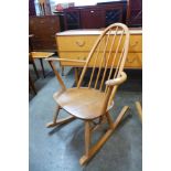 An Ercol Blonde elm and beech Quaker rocking chair