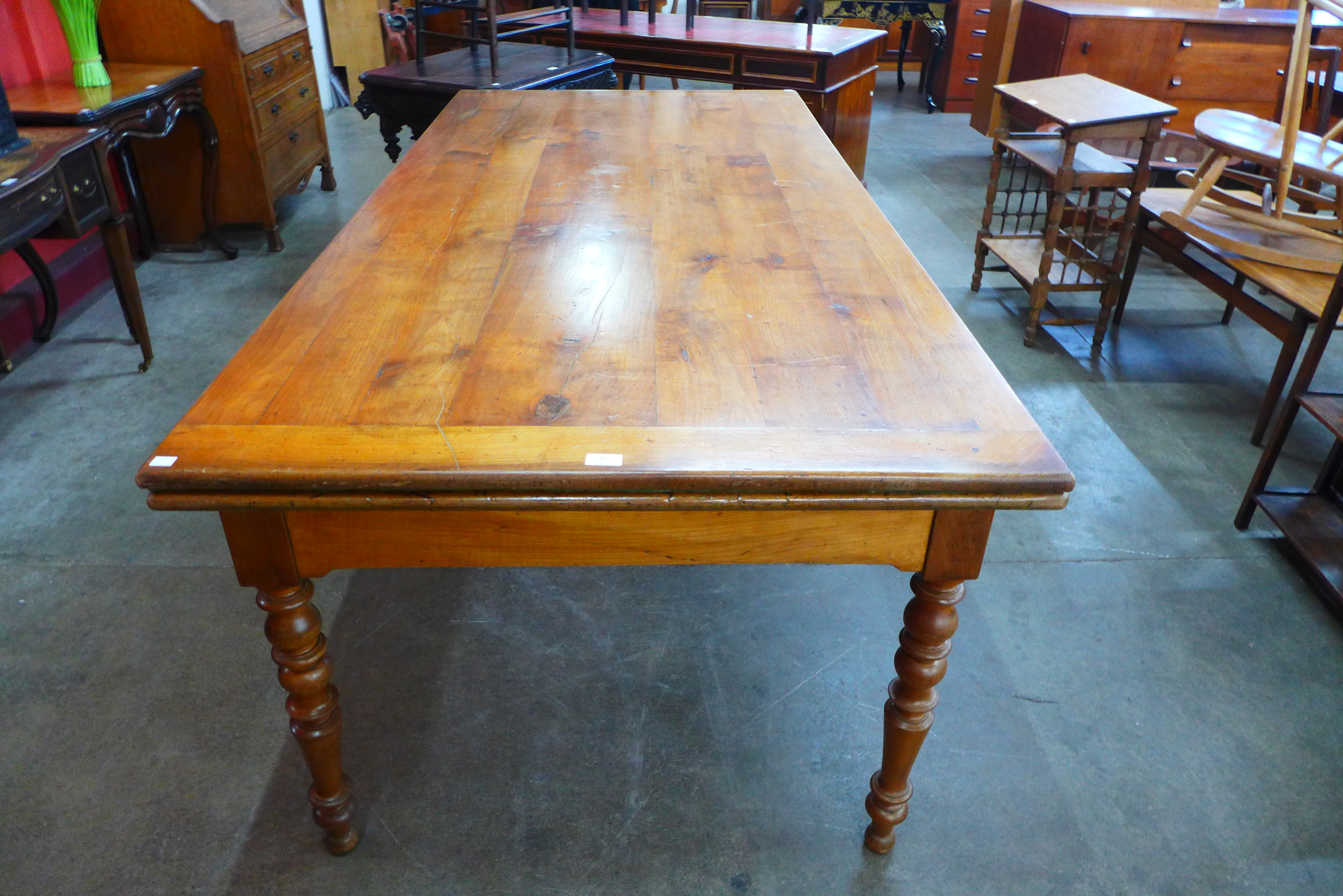 A 19th Century French cherrywood extending farmhouse table - Image 3 of 3