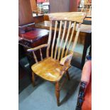 A Victorian beech and elm farmhouse armchair