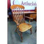 A Victorian elm and beech farmhouse armchair