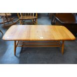 An Ercol Blonde elm and beech 459 model Windsor coffee table