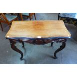 A 19th Century French rosewood serpentine concertina action fold over tea table