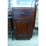 A Victorian stained pine cupboard