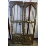 A pair of Indian carved hardwood shutter doors