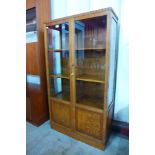 An Art Deco oak two door bookcase