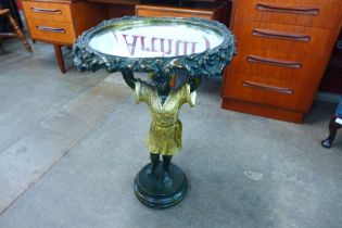 An Italian style bronze effect figural blackamoor mirrored top occasional table