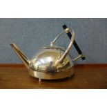 A Christopher Dresser style white metal spirit kettle