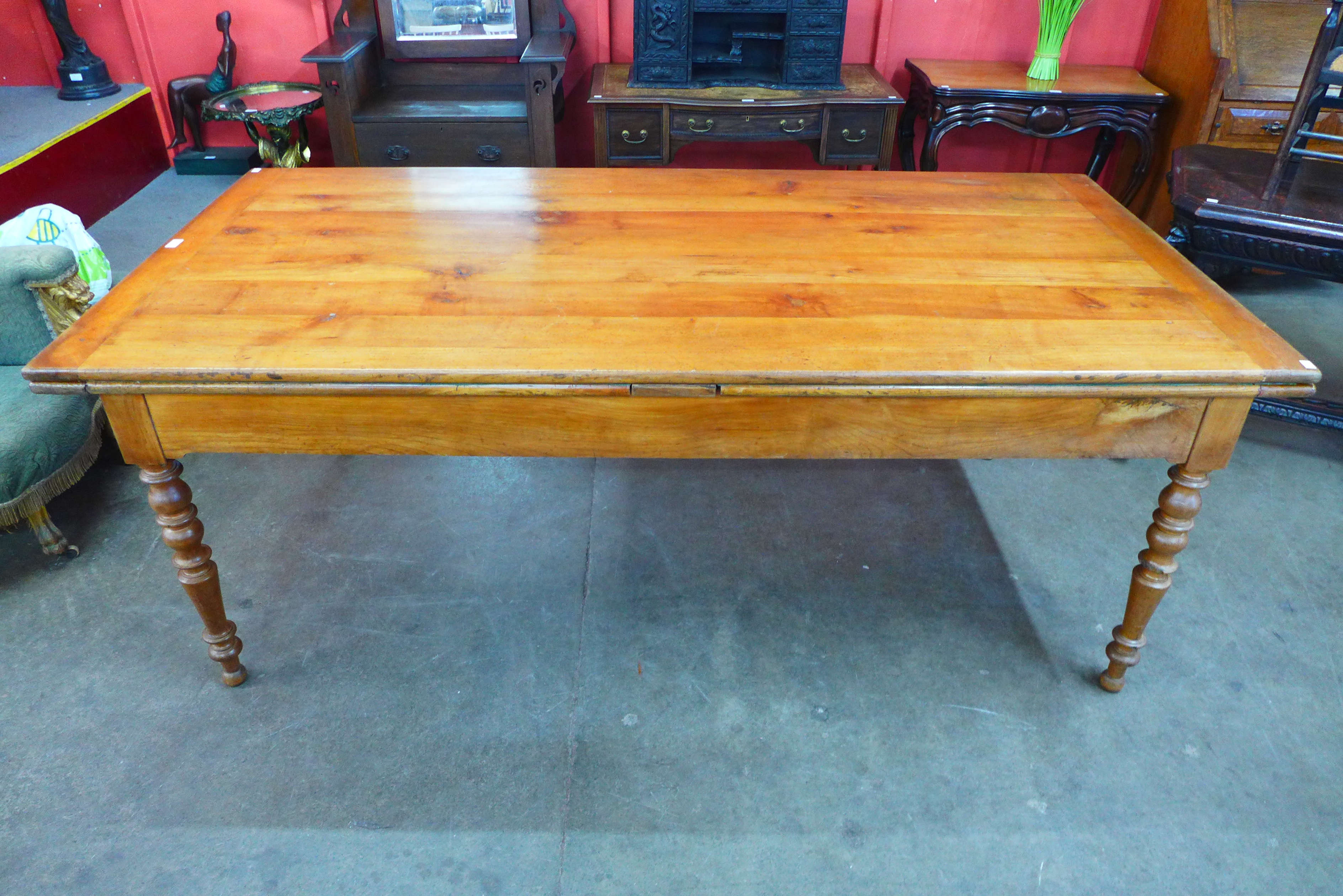 A 19th Century French cherrywood extending farmhouse table - Image 2 of 3