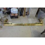 A Victorian country house brass fender