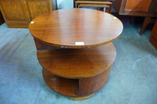 An Art Deco walnut circular coffee table