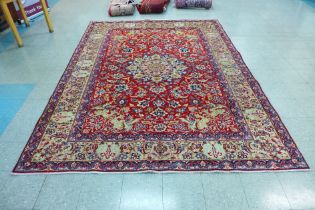 A fine hand knotted Persian Isfhan rug, 330 x 249cms