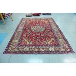 A fine hand knotted Persian Isfhan rug, 330 x 249cms