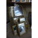 Eight gilt framed mirrors