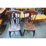 A pair of Victorian Gothic Revival mahogany kitchen chairs