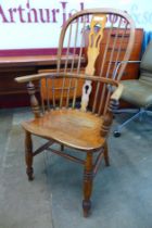 A Victorian elm, ash and beech highback Windsor armchair
