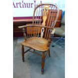 A Victorian elm, ash and beech highback Windsor armchair