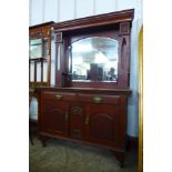 An Arts and Crafts mahogany mirrorback sideboard